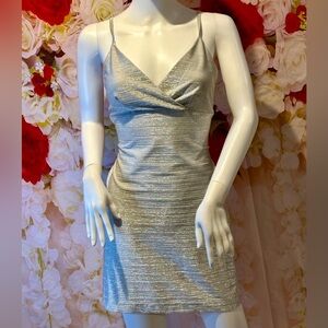 Vintage Genevieve sexy mini dress. Metallic silver, excellent like new.